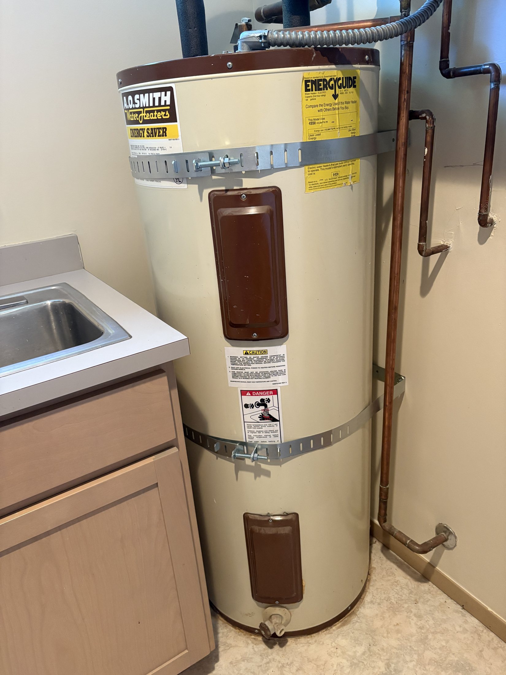 Water heater safety-strap repair for a managed property Water heater safety-strap repair for a managed property