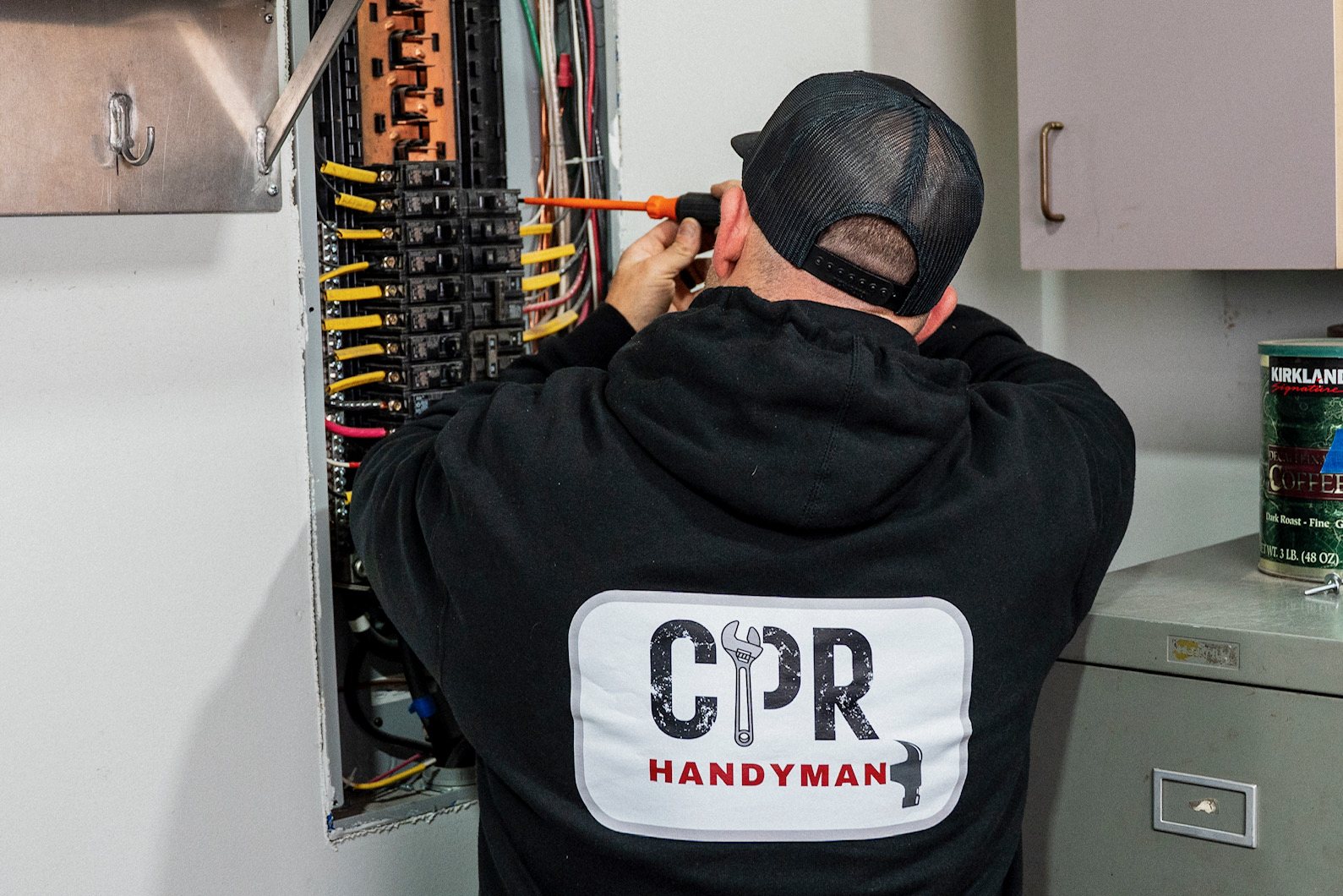 Mike from CPR Handyman completing electrical repair work Mike from CPR Handyman completing electrical repair work