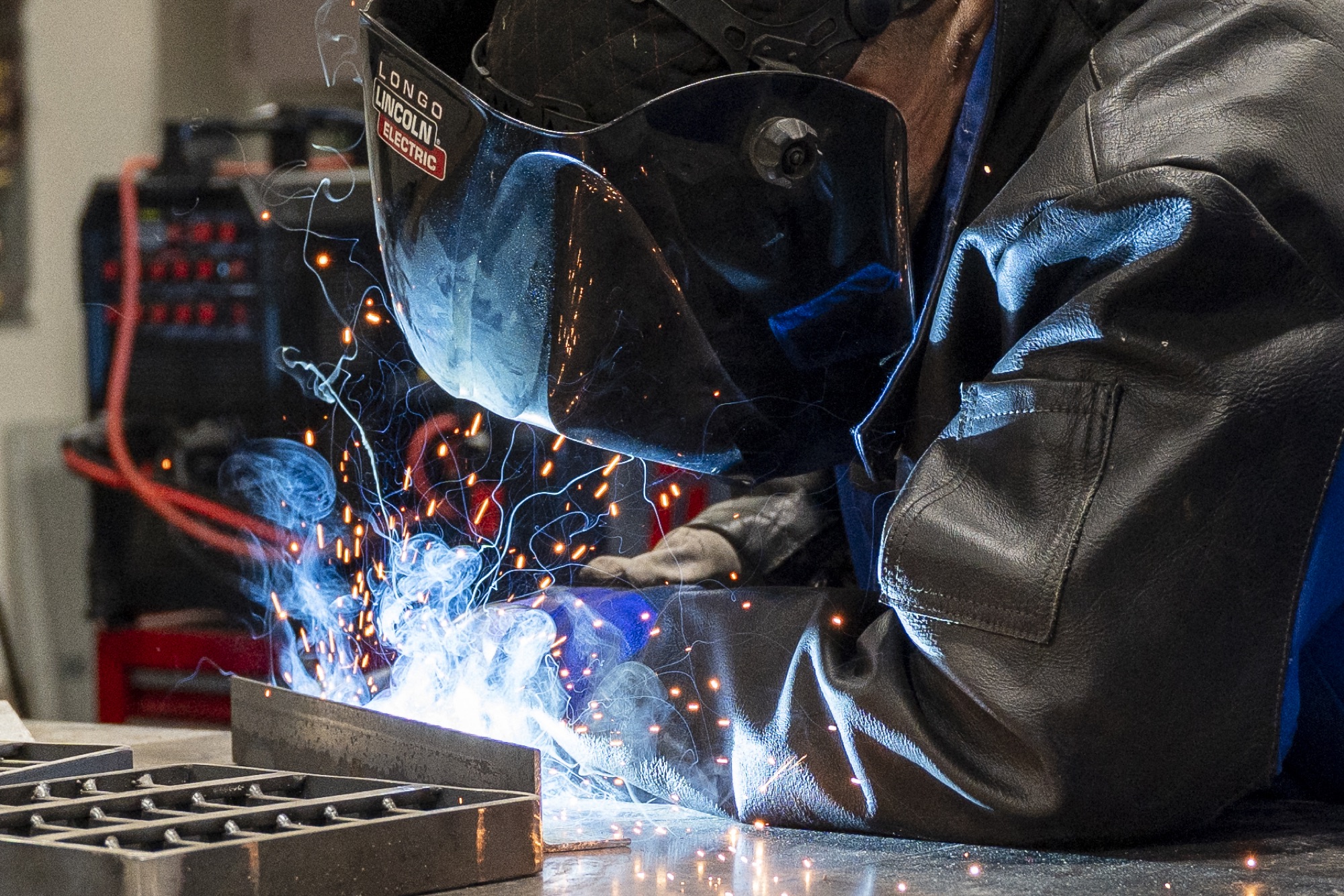 Close-up of CPR Handyman welding metal
