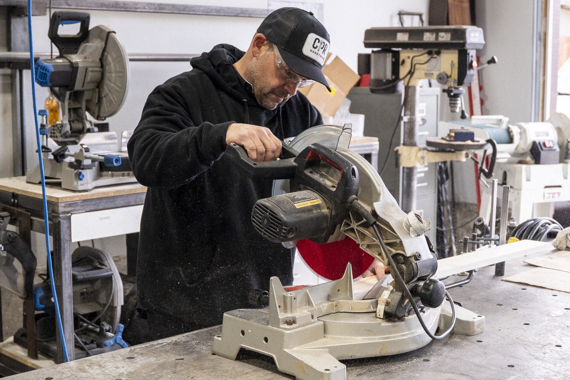 Mike from CPR Handyman preparing material in the workshop Mike from CPR Handyman preparing material in the workshop